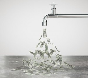 a faucet leaking money instead of water
